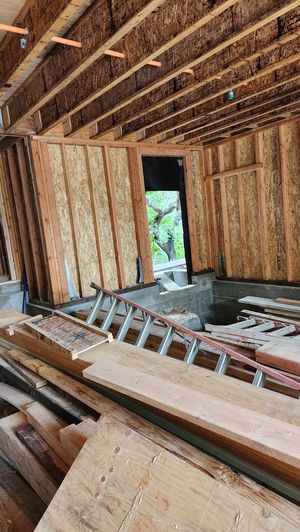 Interior Framing – Vaulted Ceiling with Exposed Joists and Window Framing