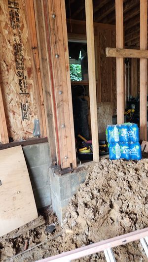 Foundation and Structural Beam Anchoring – Ground-Level Framing and Bracing