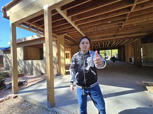 Nguyen of 9Builders at a new residential build on Athos Pl, Saratoga, CA 95070, standing in the partially constructed home.