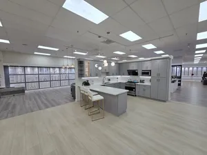 Contemporary Kitchen with Sleek Appliances and Bright Lighting