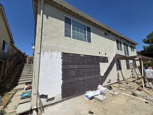 Another angle of the deck framing against the house