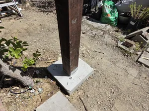 Concrete footing with wood post installation