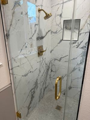 Modern Bathroom with Marble and Gold Accents