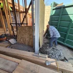 Worker Preparing the Site for Construction at 9Builders Project