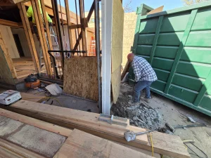 Worker Preparing the Site for Construction at 9Builders Project
