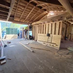 Construction Site Progress with Framing and Flooring in Place