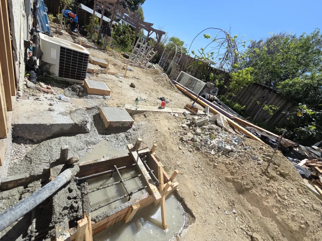 Retaining Wall Formwork and Excavation in Progress